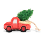 Holiday Hauler Dog Toy that looks like a truck carrying a Christmas tree